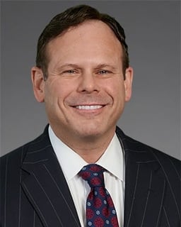 Mark Goshko, Partner logo